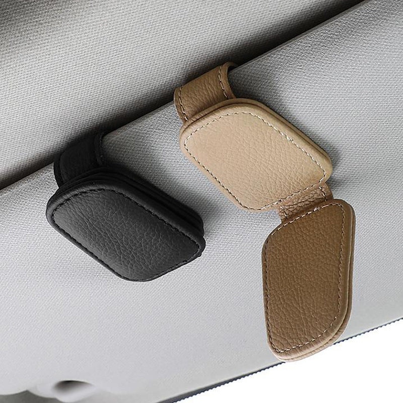 Keep your sunglasses handy with our Creative Automotive Sun Louver Clip. This stylish holder easily clips onto your car's sun visor for convenient and storage.